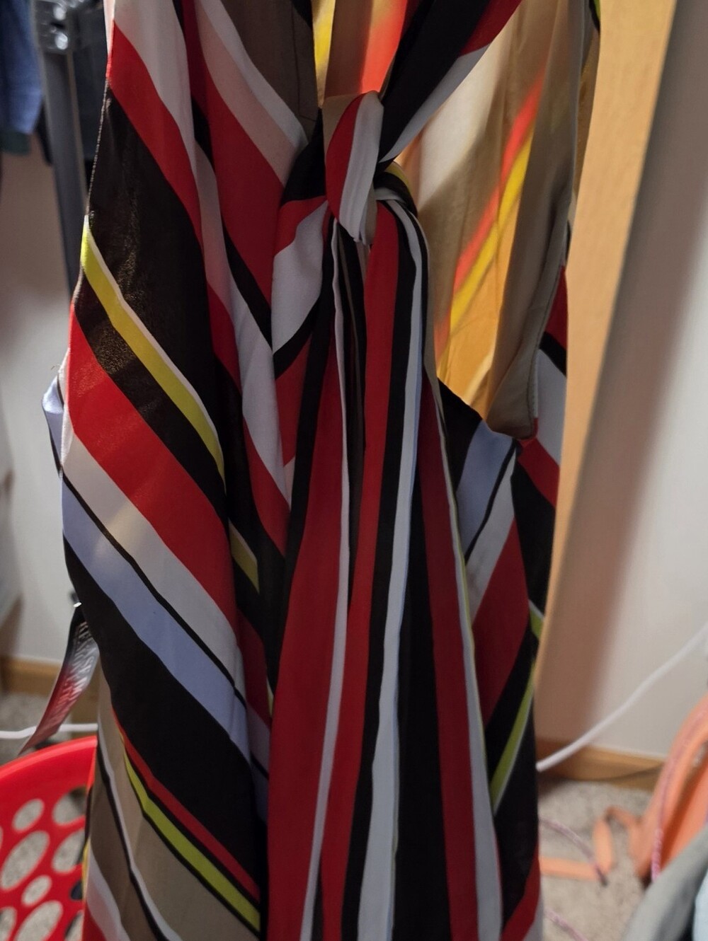 women's sleeveless maxi dress with a bold geometric stripe print.New York& Comp